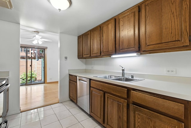 1121 S Plymouth Ct Unit A, Chicago, IL 60605 - kitchen featuring dishwasher, brown cabinets, light countertops, ceiling fan, and light tile patterned flooring