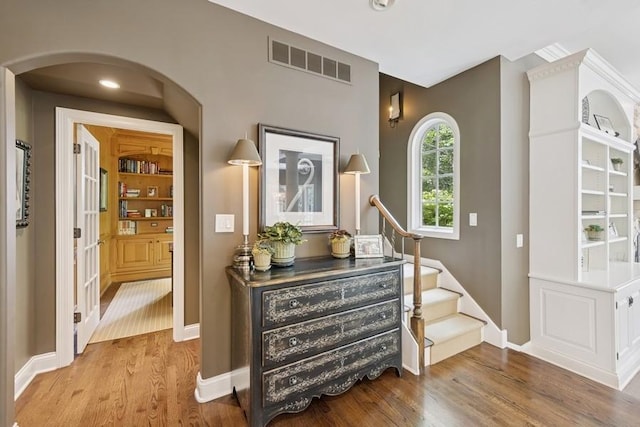 31 Oak St S, Hinsdale, IL 60521 - entrance foyer with wood finished floors, arched walkways, and stairway