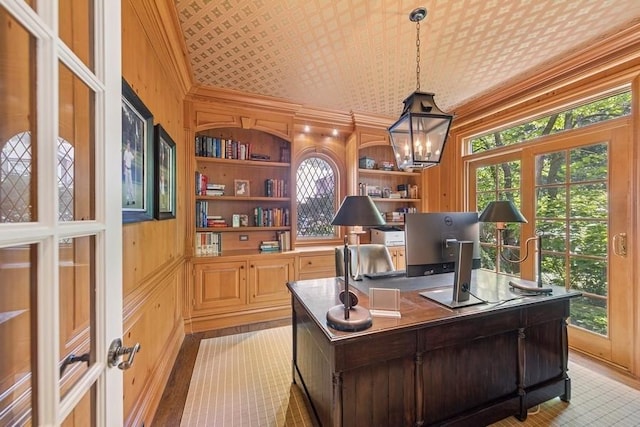 31 Oak St S, Hinsdale, IL 60521 - home office with a chandelier, built in shelves, wood walls, and crown molding
