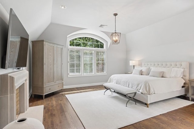 31 Oak St S, Hinsdale, IL 60521 - bedroom with dark wood-style flooring and vaulted ceiling