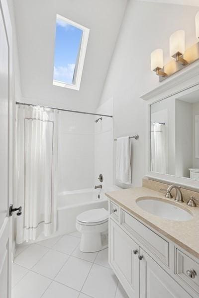 31 Oak St S, Hinsdale, IL 60521 - full bath with a skylight, tile patterned flooring, vanity, shower / bath combination with curtain, and vaulted ceiling