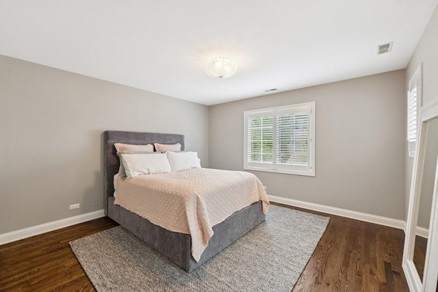 31 Oak St S, Hinsdale, IL 60521 - bedroom with multiple windows and dark wood-style floors