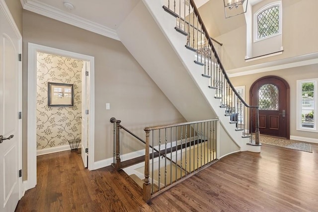 31 Oak St S, Hinsdale, IL 60521 - entryway featuring wood finished floors, ornamental molding, and a chandelier