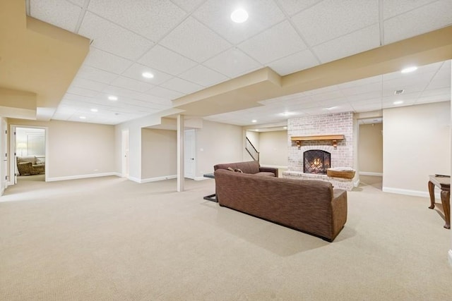 31 Oak St S, Hinsdale, IL 60521 - carpeted living area with a drop ceiling, a brick fireplace, stairway, and recessed lighting