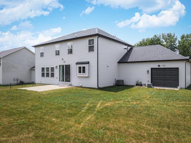 207 Eldon Dr, Downs, IL 61736 - rear view of house featuring a garage and a patio