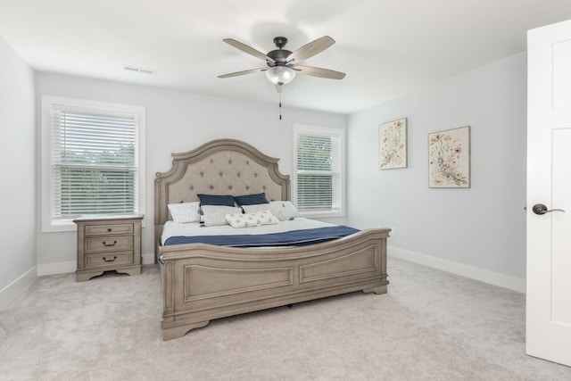 207 Eldon Dr, Downs, IL 61736 - bedroom with light carpet and ceiling fan