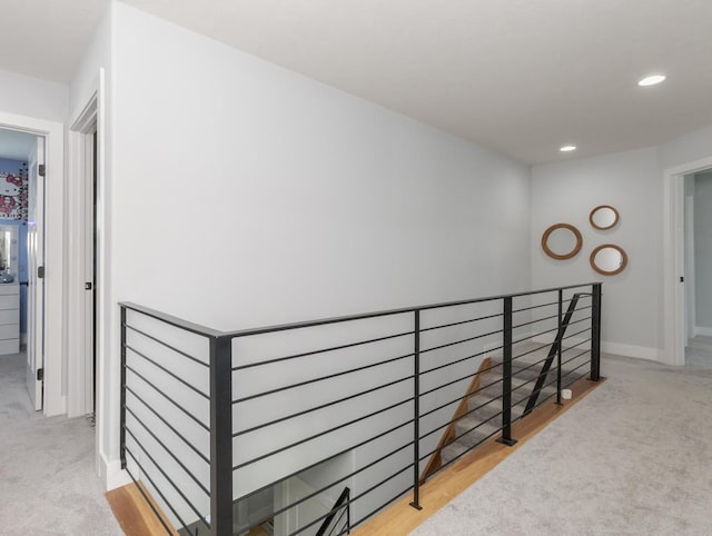 207 Eldon Dr, Downs, IL 61736 - hallway with an upstairs landing, carpet flooring, and recessed lighting