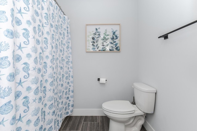 207 Eldon Dr, Downs, IL 61736 - bathroom with wood tiled floors and a shower with curtain