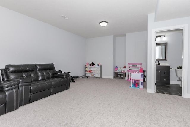207 Eldon Dr, Downs, IL 61736 - carpeted living area with baseboards
