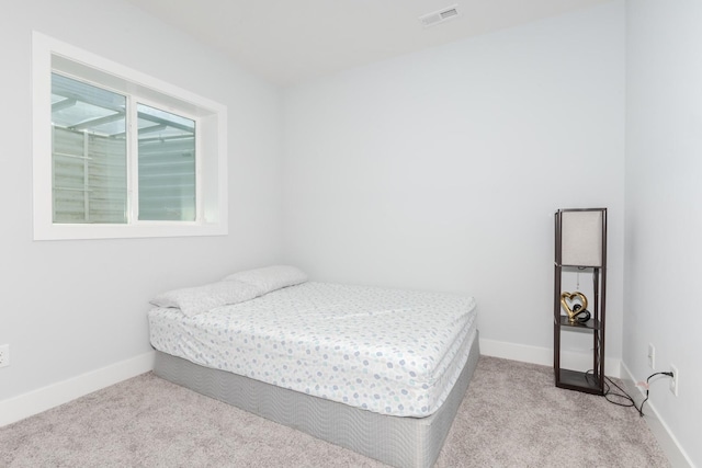 207 Eldon Dr, Downs, IL 61736 - carpeted bedroom with baseboards