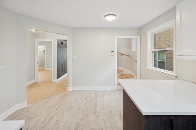 5406 N Mulligan Ave, Chicago, IL 60630 - kitchen with light wood-style floors and light countertops