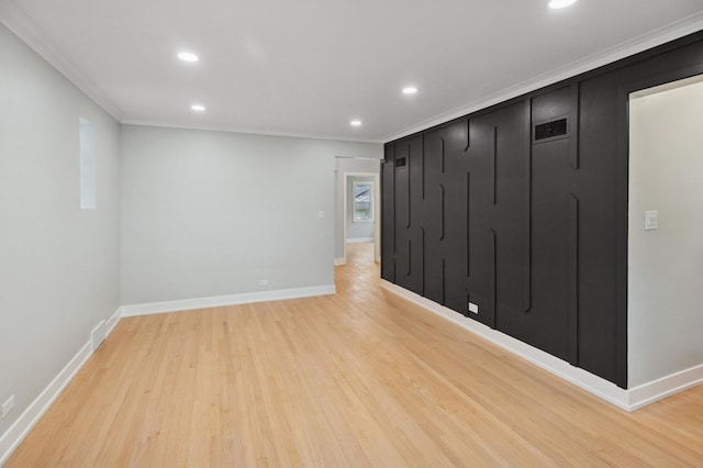 5406 N Mulligan Ave, Chicago, IL 60630 - empty room with light wood-style flooring, recessed lighting, and ornamental molding