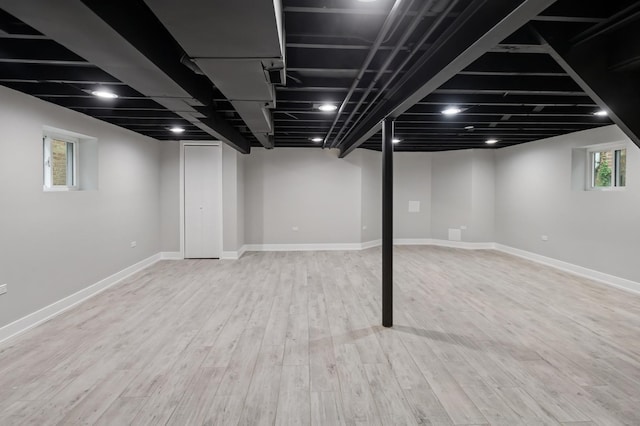 5406 N Mulligan Ave, Chicago, IL 60630 - basement featuring wood finished floors and baseboards
