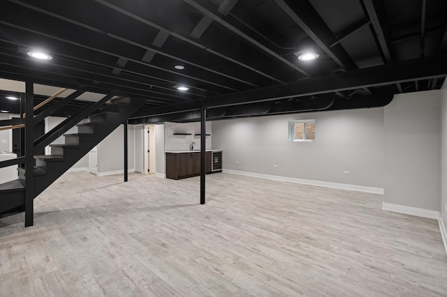 5406 N Mulligan Ave, Chicago, IL 60630 - finished basement with stairs, wood finished floors, wine cooler, and bar area