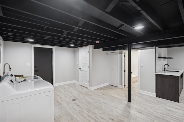 5406 N Mulligan Ave, Chicago, IL 60630 - washroom featuring light wood-style flooring and washing machine and dryer