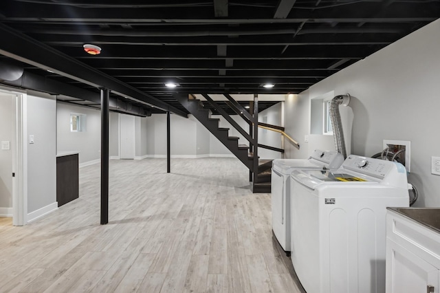 5406 N Mulligan Ave, Chicago, IL 60630 - finished basement with separate washer and dryer, light wood finished floors, and stairs