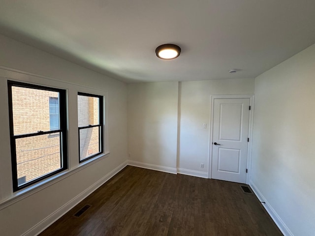 3512 Woodside Ave, Brookfield, IL 60513 - empty room with dark wood-style floors