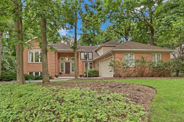 7509 Bittersweet Dr, Gurnee, IL 60031 - view of front of house with a garage, brick siding, driveway, and a shingled roof