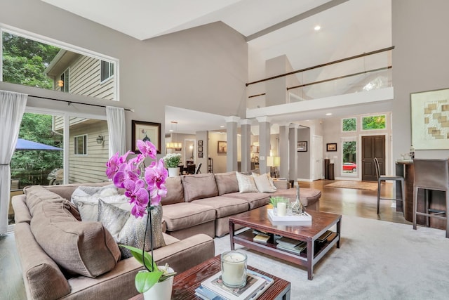 7509 Bittersweet Dr, Gurnee, IL 60031 - living area featuring a high ceiling, wood finished floors, and a chandelier