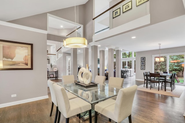 7509 Bittersweet Dr, Gurnee, IL 60031 - dining area with wood finished floors, recessed lighting, a high ceiling, and ornate columns