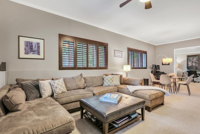 7509 Bittersweet Dr, Gurnee, IL 60031 - living area with light carpet, ornamental molding, and ceiling fan