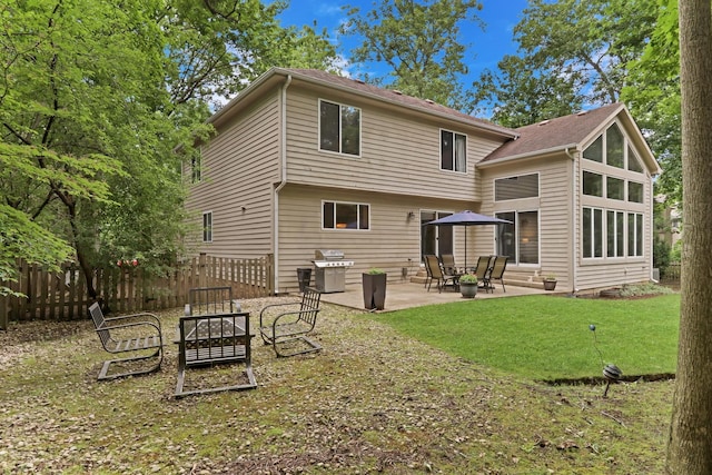 7509 Bittersweet Dr, Gurnee, IL 60031 - rear view of house with a patio and an outdoor fire pit