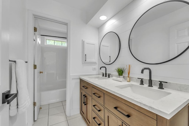 2011 Gleneagle Dr, Plainfield, IL 60586 - full bathroom with double vanity, tile patterned flooring, and washtub / shower combination