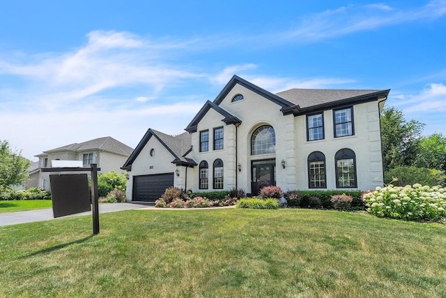 2011 Gleneagle Dr, Plainfield, IL 60586 - french country inspired facade with a front yard, driveway, and an attached garage