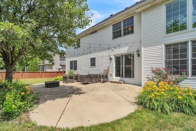 2011 Gleneagle Dr, Plainfield, IL 60586 - rear view of property featuring an outdoor living space with a fire pit and a patio