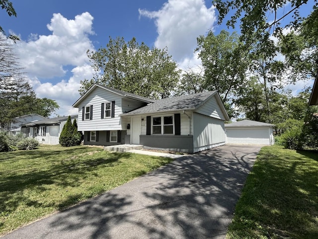 4240 Greenbrier Ln, Richton Park, IL 60471 - split level home featuring an outdoor structure, a garage, a front lawn, and a shingled roof
