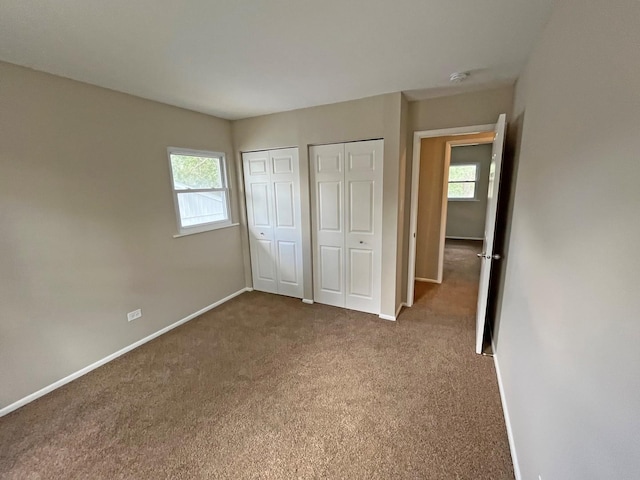 4240 Greenbrier Ln, Richton Park, IL 60471 - unfurnished bedroom with multiple closets and carpet floors