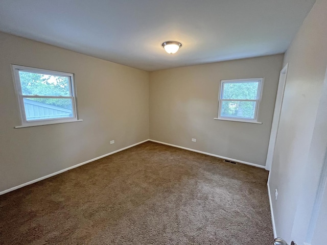 4240 Greenbrier Ln, Richton Park, IL 60471 - empty room with dark colored carpet and baseboards