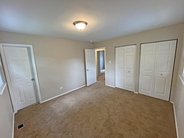 4240 Greenbrier Ln, Richton Park, IL 60471 - unfurnished bedroom featuring two closets and carpet flooring