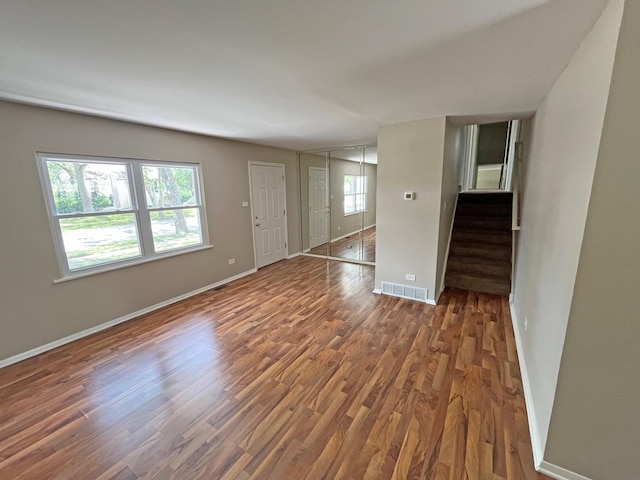 4240 Greenbrier Ln, Richton Park, IL 60471 - spare room with wood finished floors and stairway