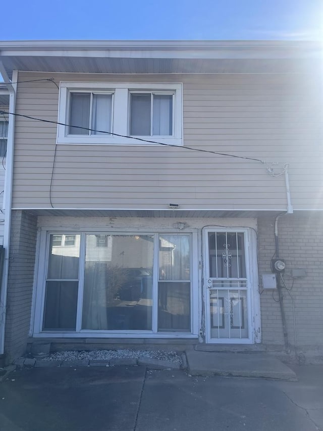 1300 E 87th St, Chicago, IL 60619 - rear view of property with brick siding