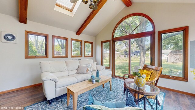 265 N Shaddle Ave, Mundelein, IL 60060 - living area featuring beam ceiling, wood finished floors, a skylight, a ceiling fan, and high vaulted ceiling