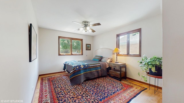 265 N Shaddle Ave, Mundelein, IL 60060 - bedroom with multiple windows, wood finished floors, and ceiling fan