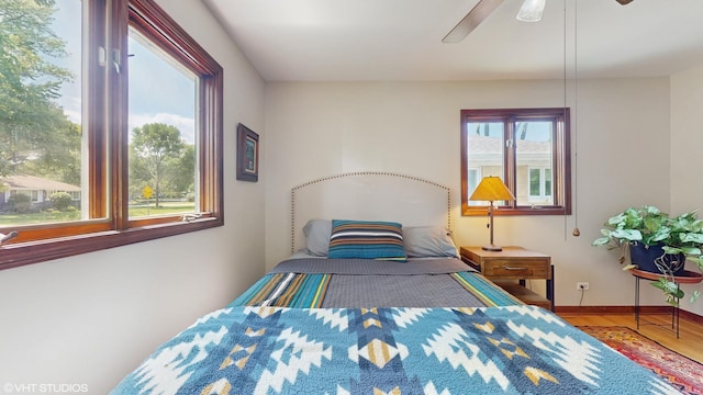 265 N Shaddle Ave, Mundelein, IL 60060 - bedroom with wood finished floors and a ceiling fan
