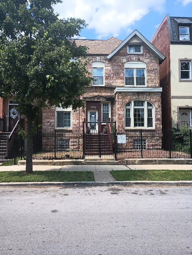 2236 W Monroe St, Chicago, IL 60612 - view of front of property featuring a fenced front yard and stone siding