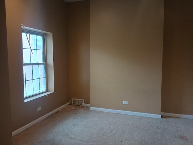2236 W Monroe St, Chicago, IL 60612 - carpeted empty room with baseboards