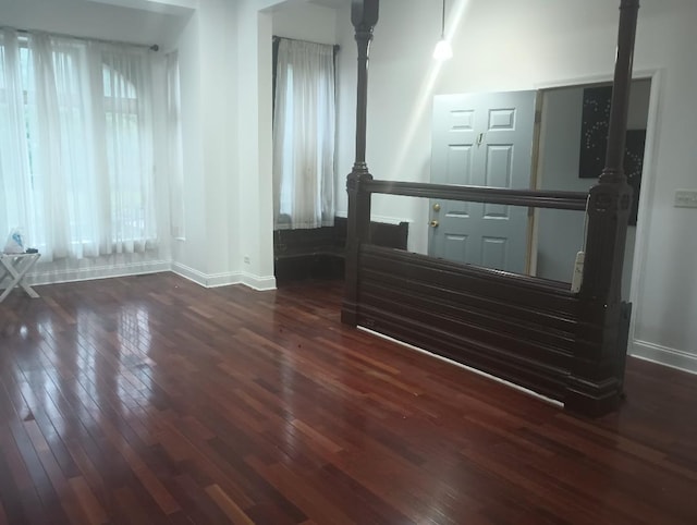 2236 W Monroe St, Chicago, IL 60612 - unfurnished living room featuring wood-type flooring and baseboards