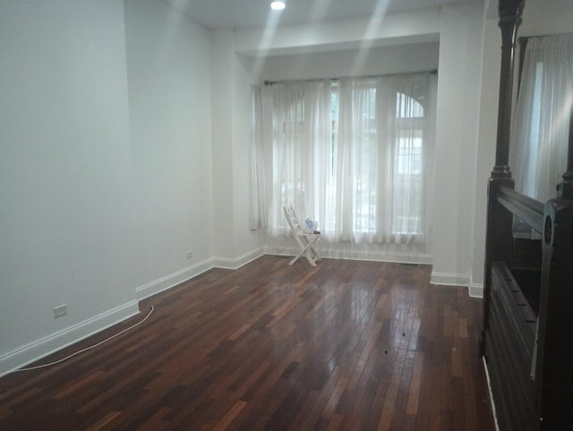 2236 W Monroe St, Chicago, IL 60612 - unfurnished living room featuring dark wood finished floors and baseboards