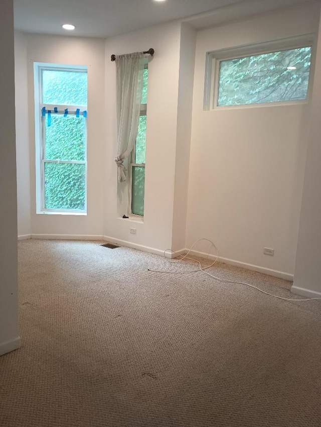2236 W Monroe St, Chicago, IL 60612 - carpeted spare room featuring baseboards and recessed lighting