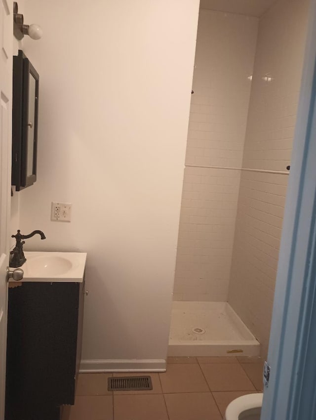 2236 W Monroe St, Chicago, IL 60612 - bathroom with tile patterned floors, a stall shower, and vanity