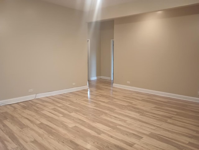 2236 W Monroe St, Chicago, IL 60612 - spare room with light wood-type flooring and baseboards