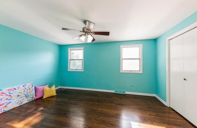 536 S Echo Ln, Palatine, IL 60067 - unfurnished bedroom featuring a closet, wood finished floors, and a ceiling fan