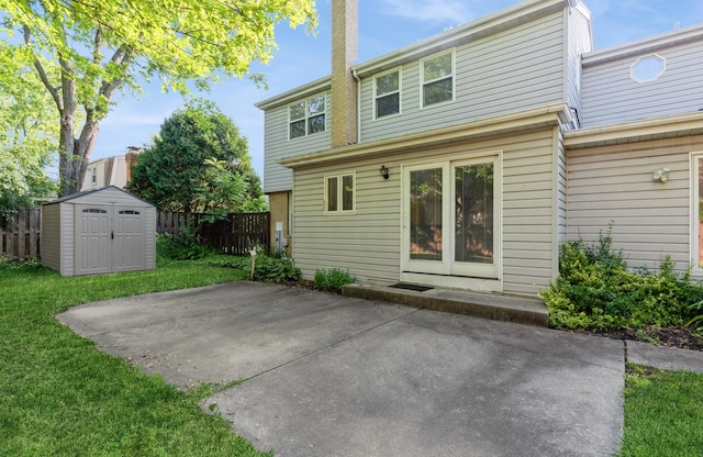536 S Echo Ln, Palatine, IL 60067 - rear view of house with a patio area, a storage unit, and a chimney