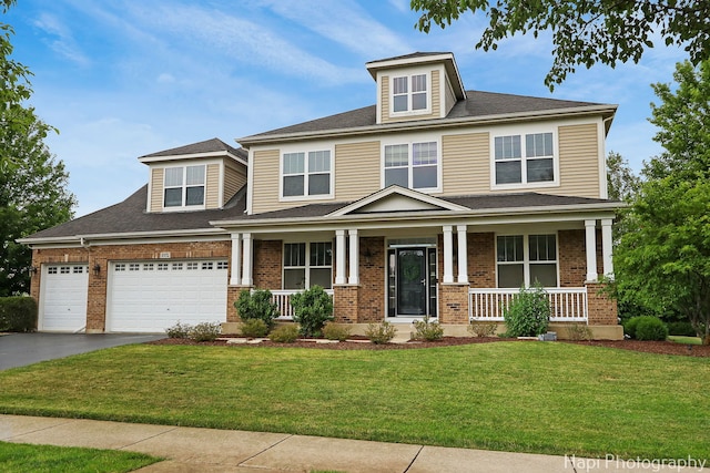 10174 Hopkins St, Huntley, IL 60142 - view of front of property with a porch, driveway, and brick siding