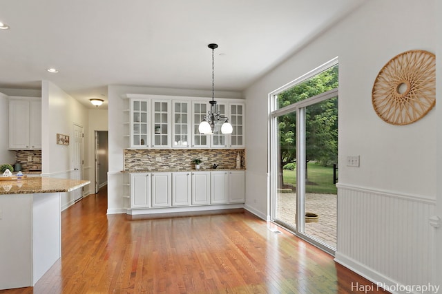 10174 Hopkins St, Huntley, IL 60142 - kitchen with open shelves, white cabinetry, tasteful backsplash, light wood-type flooring, and recessed lighting