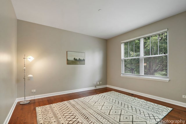 10174 Hopkins St, Huntley, IL 60142 - spare room featuring baseboards and wood finished floors